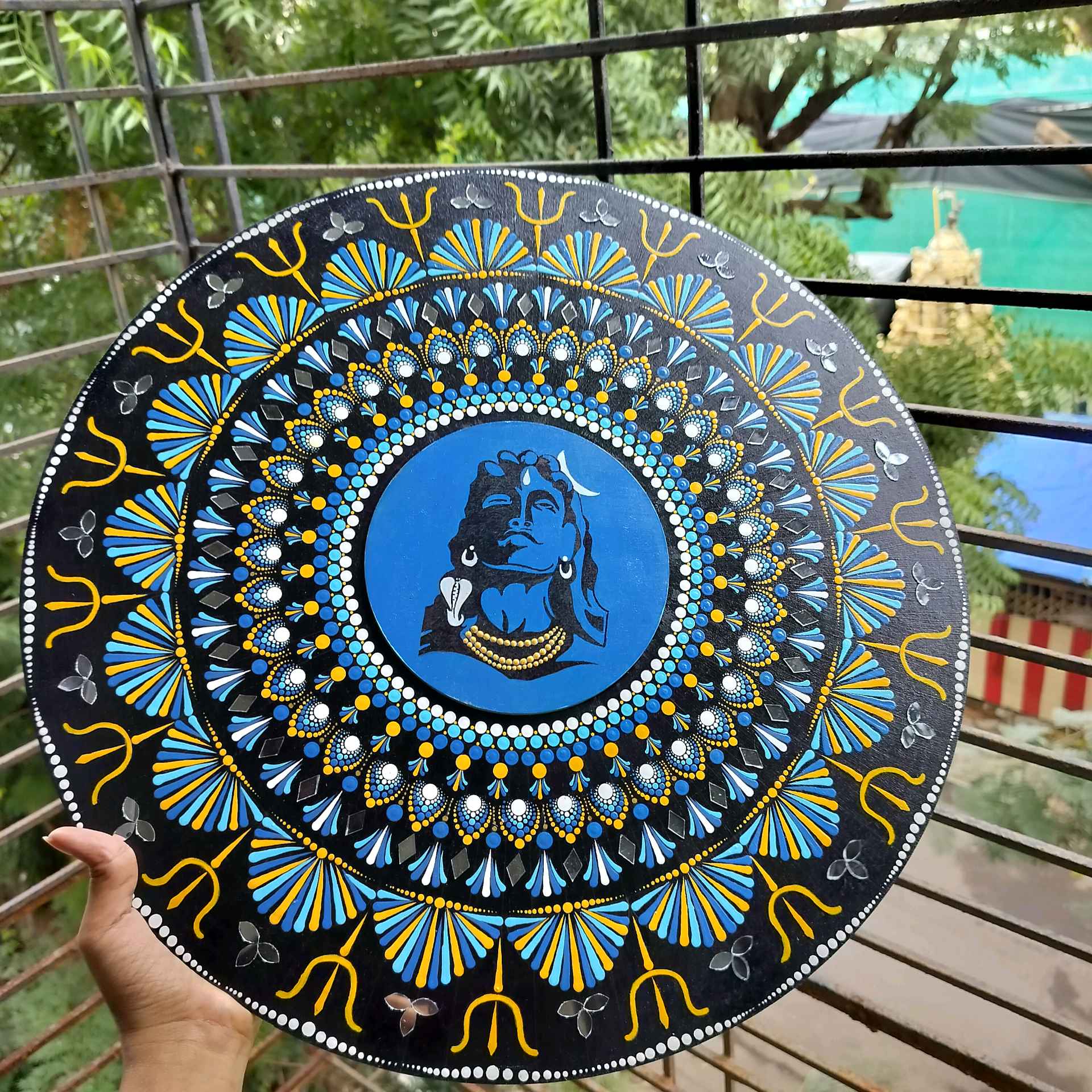 Mandala with god in between